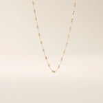 14k solid gold textured chain necklace with subtle shine and detailed finish. A classic gold chain with a unique touch. Great for everyday wear or layering.