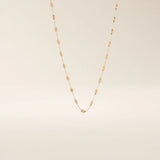 14k solid gold textured chain necklace with subtle shine and detailed finish. A classic gold chain with a unique touch. Great for everyday wear or layering.