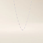 14k solid gold textured chain necklace with subtle shine and detailed finish. A classic gold chain with a unique touch. Great for everyday wear or layering.