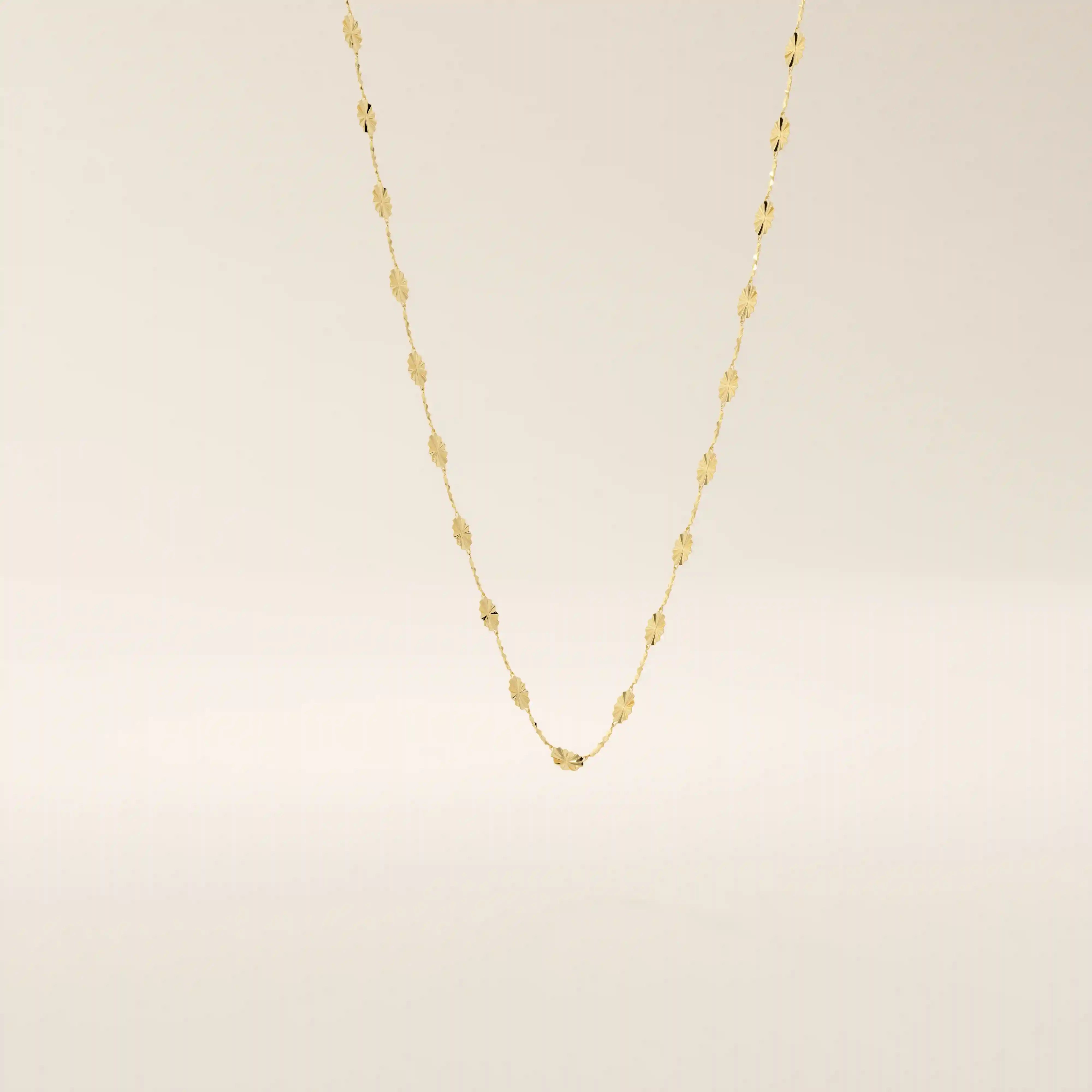 14k solid gold textured chain necklace with subtle shine and detailed finish. A classic gold chain with a unique touch. Great for everyday wear or layering.