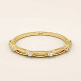 14k solid gold thin stacking ring with a minimalist design. A simple and elegant band perfect for layering.