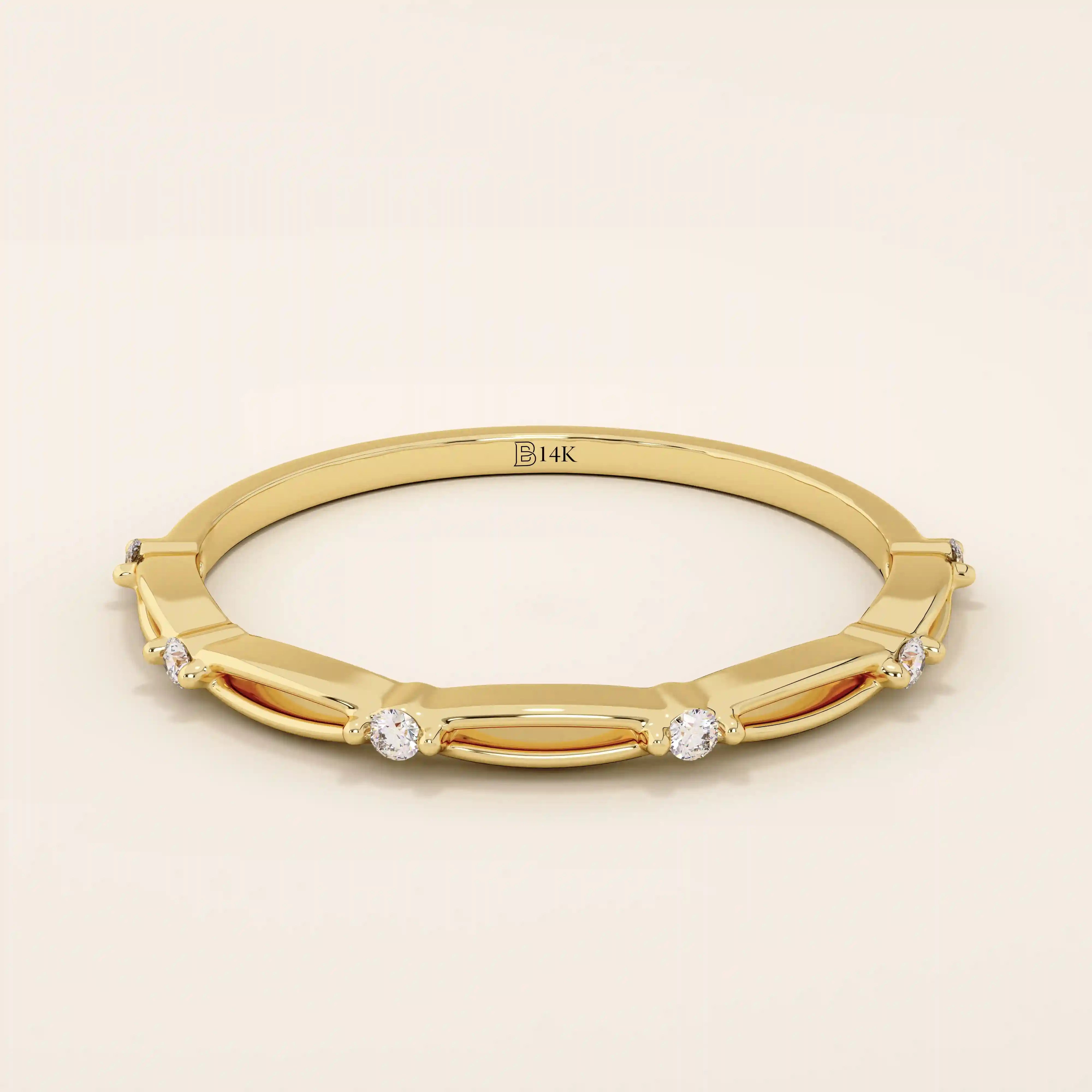 14k solid gold thin stacking ring with a minimalist design. A simple and elegant band perfect for layering.