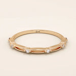 14k solid gold thin stacking ring with a minimalist design. A simple and elegant band perfect for layering.