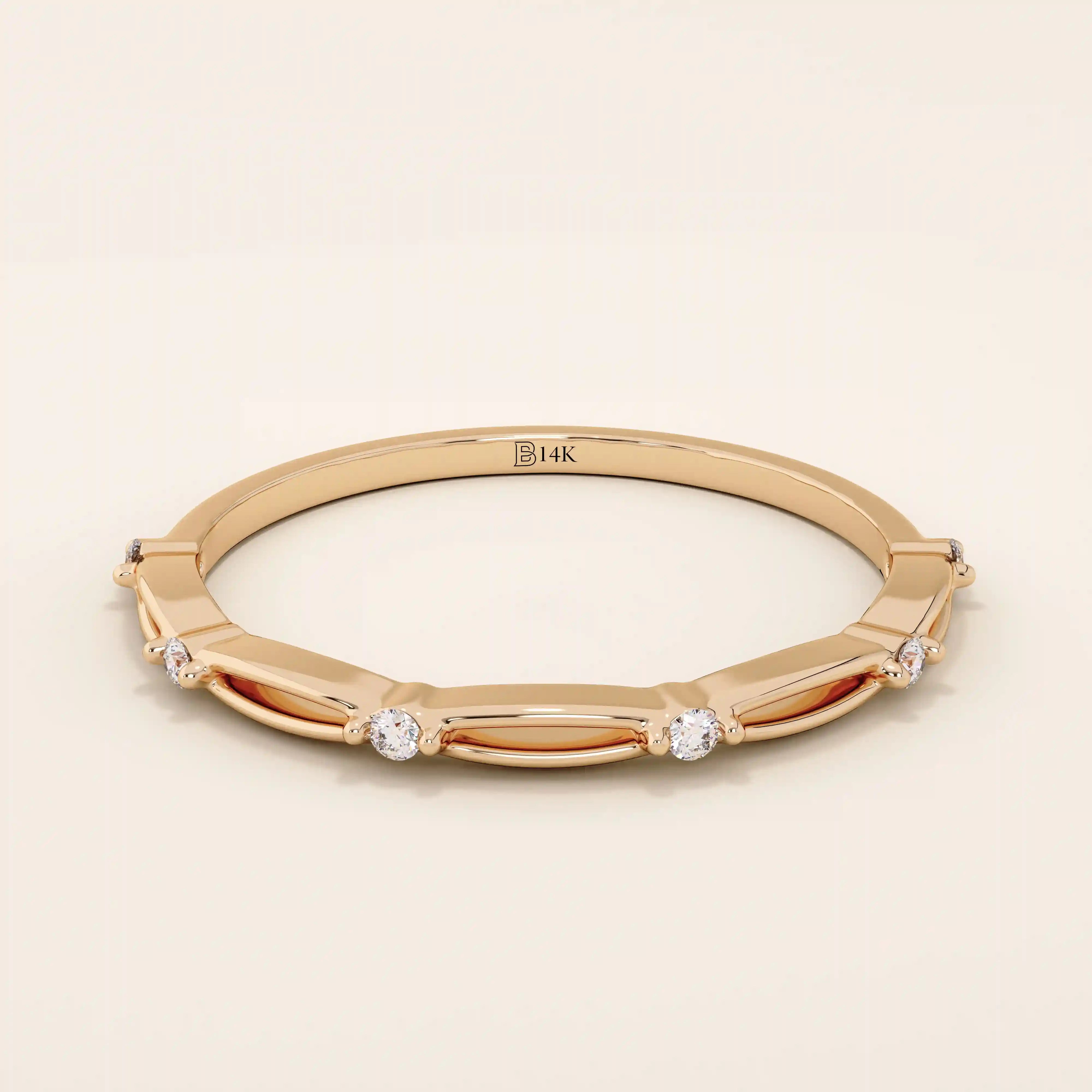 14k solid gold thin stacking ring with a minimalist design. A simple and elegant band perfect for layering.