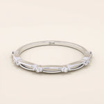 14k solid gold thin stacking ring with a minimalist design. A simple and elegant band perfect for layering.