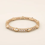 14k solid gold ultra-slim stacking ring with an eternity spike design. Minimalist gold ring for layering or everyday wear.