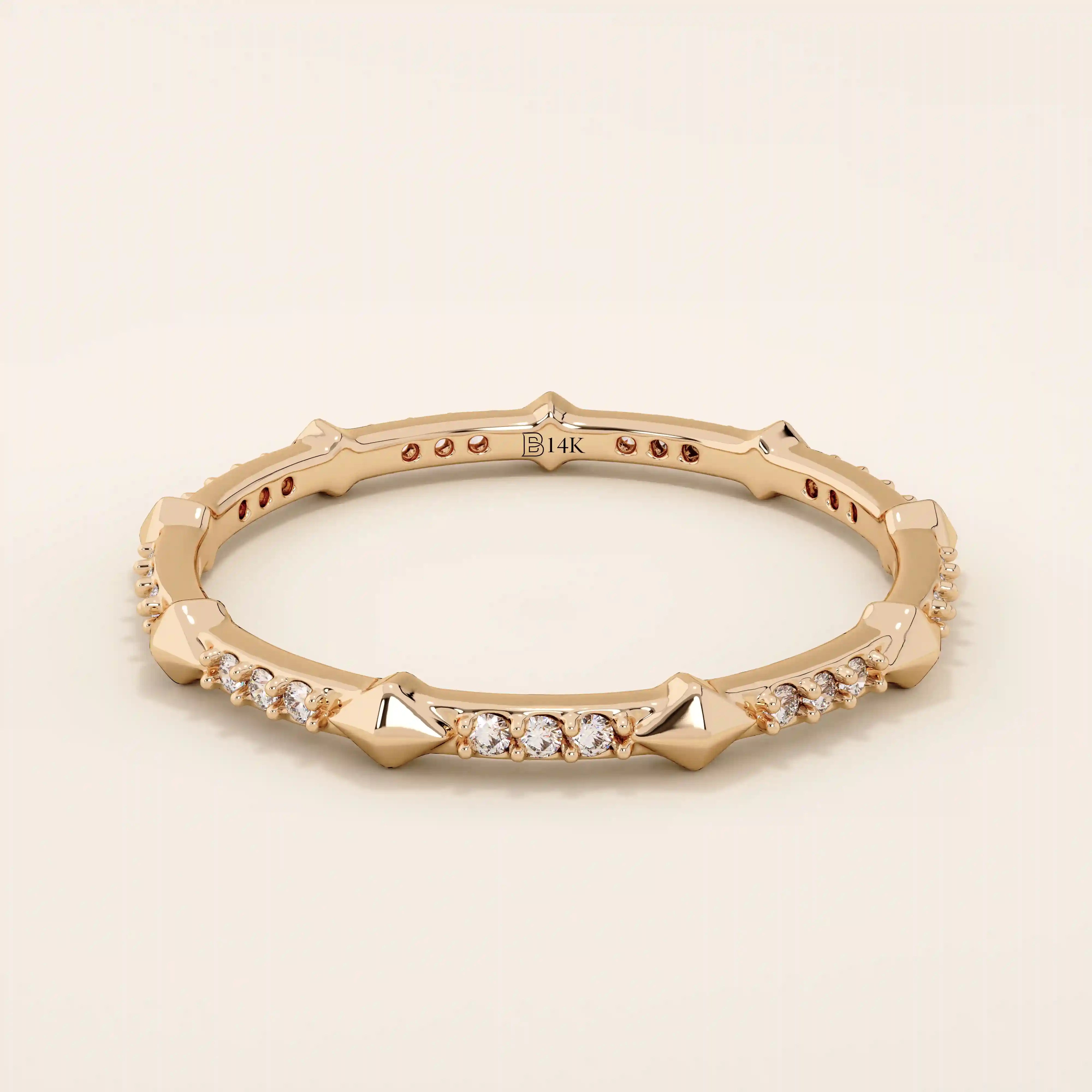 14k solid gold ultra-slim stacking ring with an eternity spike design. Minimalist gold ring for layering or everyday wear.