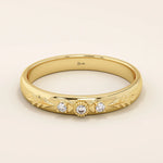 14k solid gold vintage-style leaf band promise ring with intricate botanical engraving. A timeless and elegant symbol of love and nature.