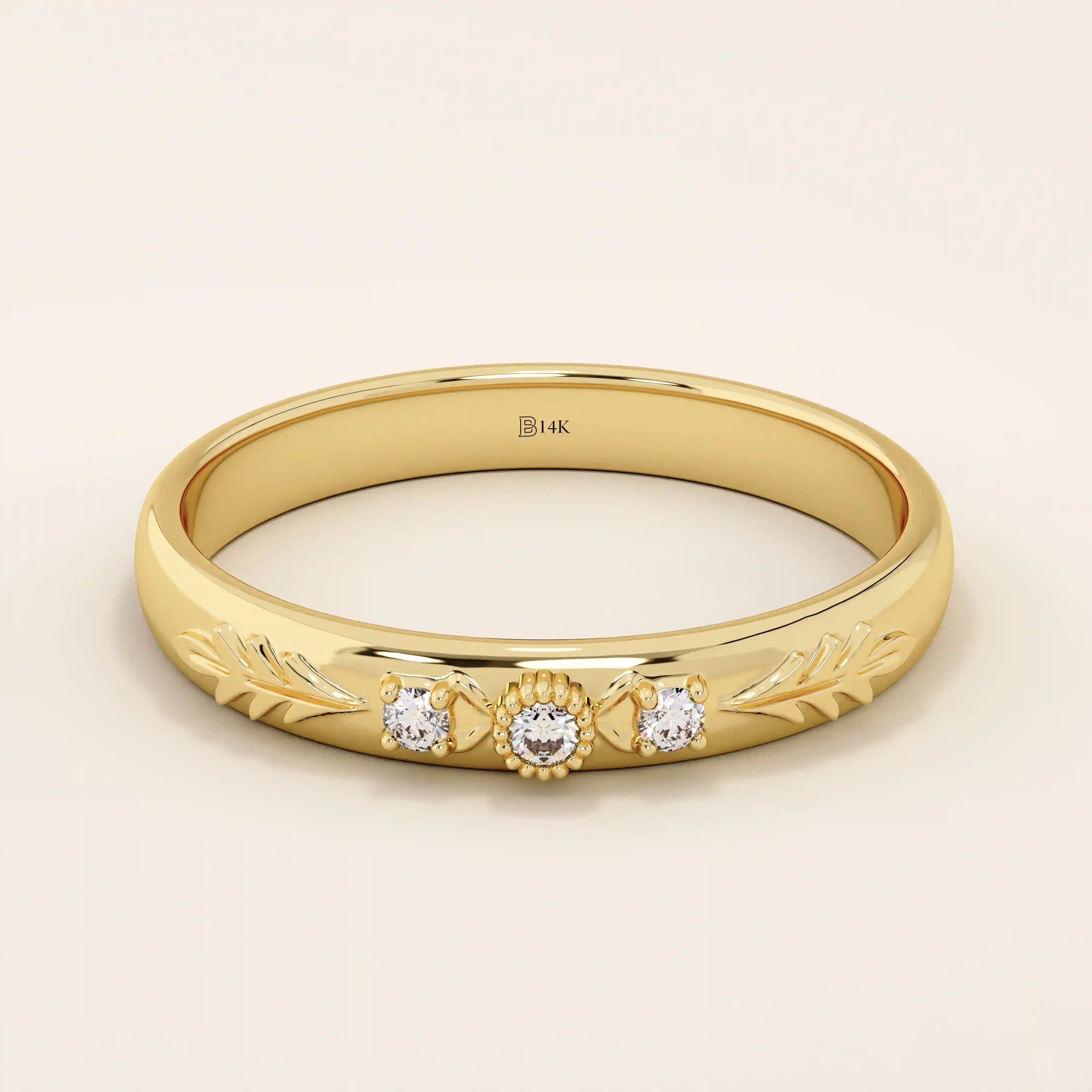 14k solid gold vintage-style leaf band promise ring with intricate botanical engraving. A timeless and elegant symbol of love and nature.