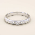 14k solid gold vintage-style leaf band promise ring with intricate botanical engraving. A timeless and elegant symbol of love and nature.