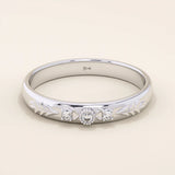 14k solid gold vintage-style leaf band promise ring with intricate botanical engraving. A timeless and elegant symbol of love and nature.