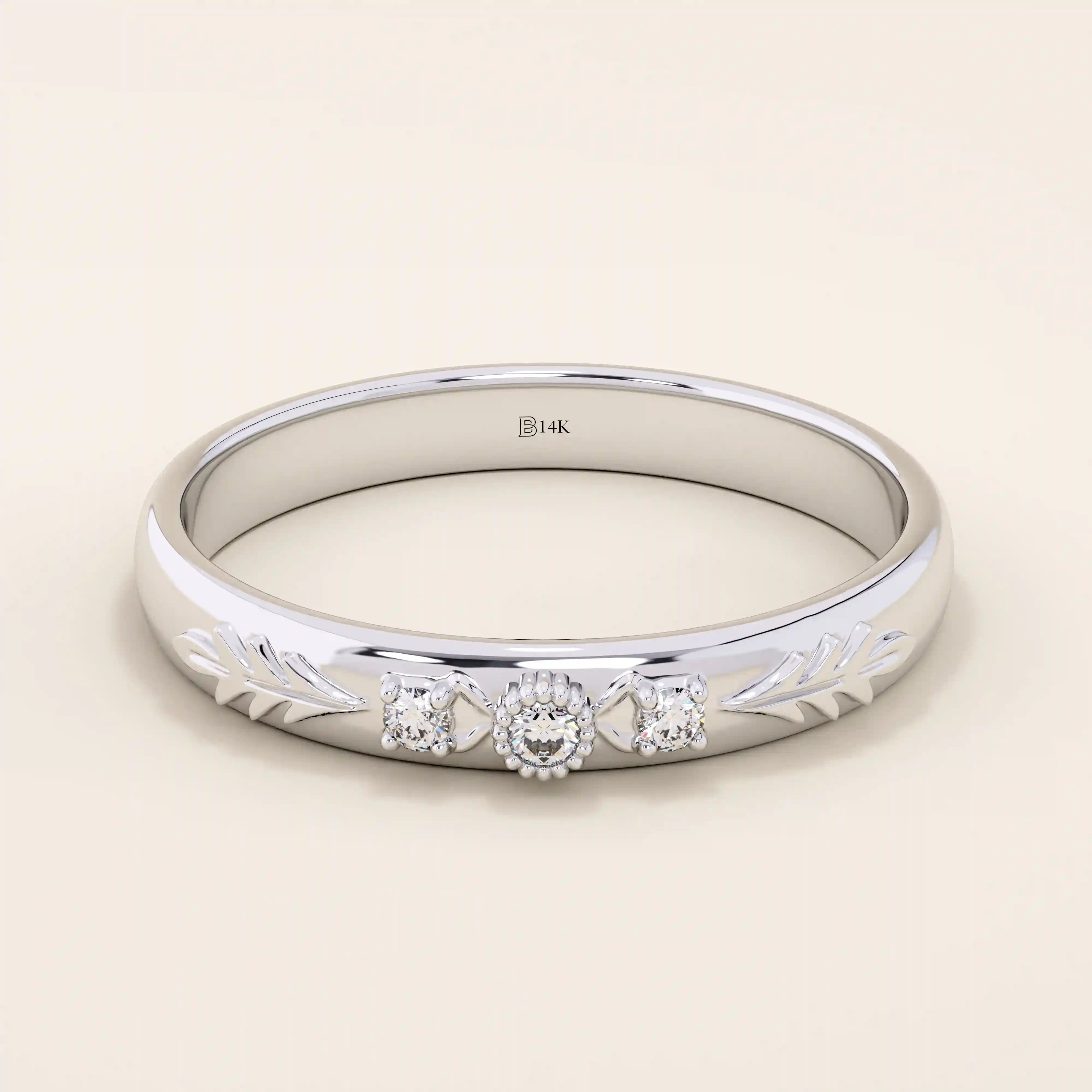 14k solid gold vintage-style leaf band promise ring with intricate botanical engraving. A timeless and elegant symbol of love and nature.