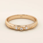 14k solid gold vintage-style leaf band promise ring with intricate botanical engraving. A timeless and elegant symbol of love and nature.