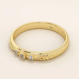 14k solid gold vintage-style leaf band promise ring with intricate botanical engraving. A timeless and elegant symbol of love and nature.