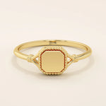 14k solid gold vintage-style square-shaped signet ring with classic detailing. Timeless and elegant design for everyday wear.