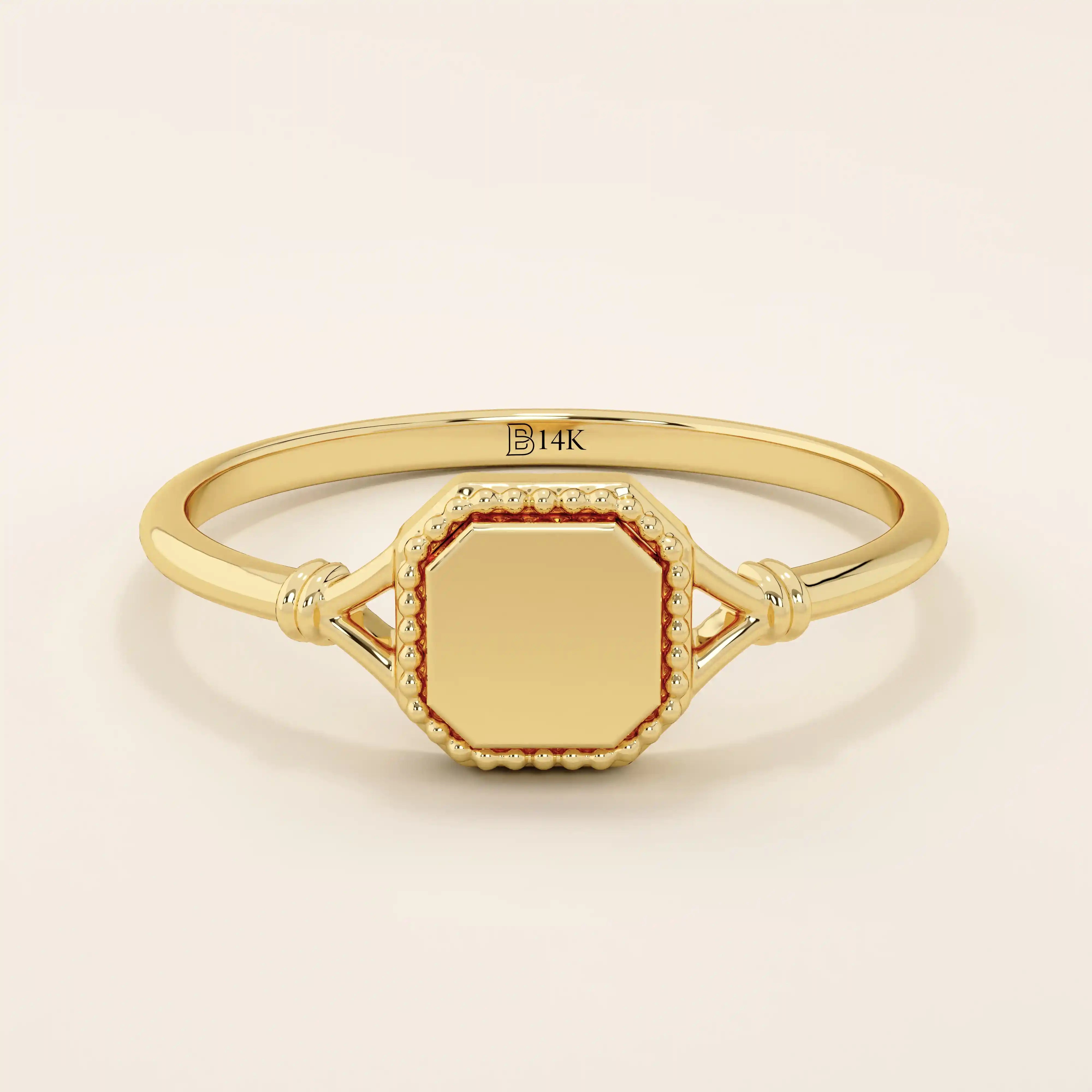 14k solid gold vintage-style square-shaped signet ring with classic detailing. Timeless and elegant design for everyday wear.