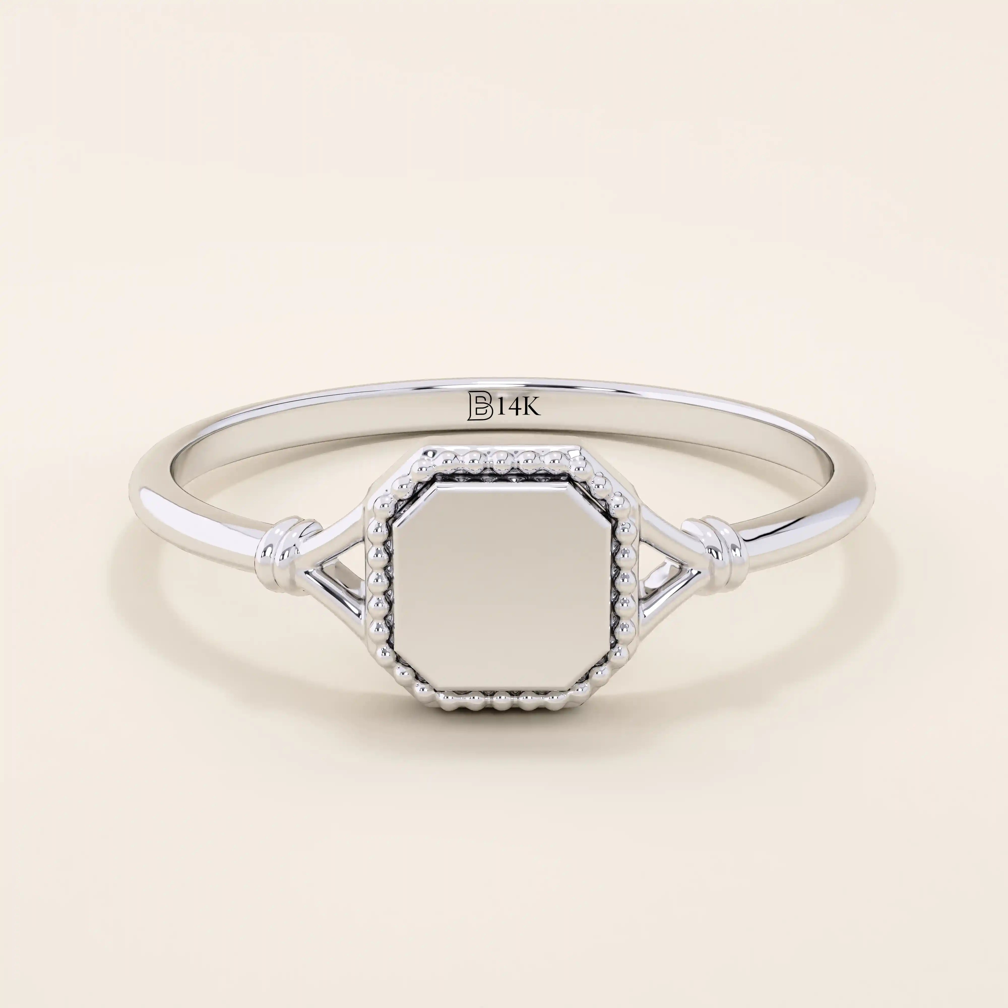 14k solid gold vintage-style square-shaped signet ring with classic detailing. Timeless and elegant design for everyday wear.