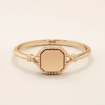 14k solid gold vintage-style square-shaped signet ring with classic detailing. Timeless and elegant design for everyday wear.