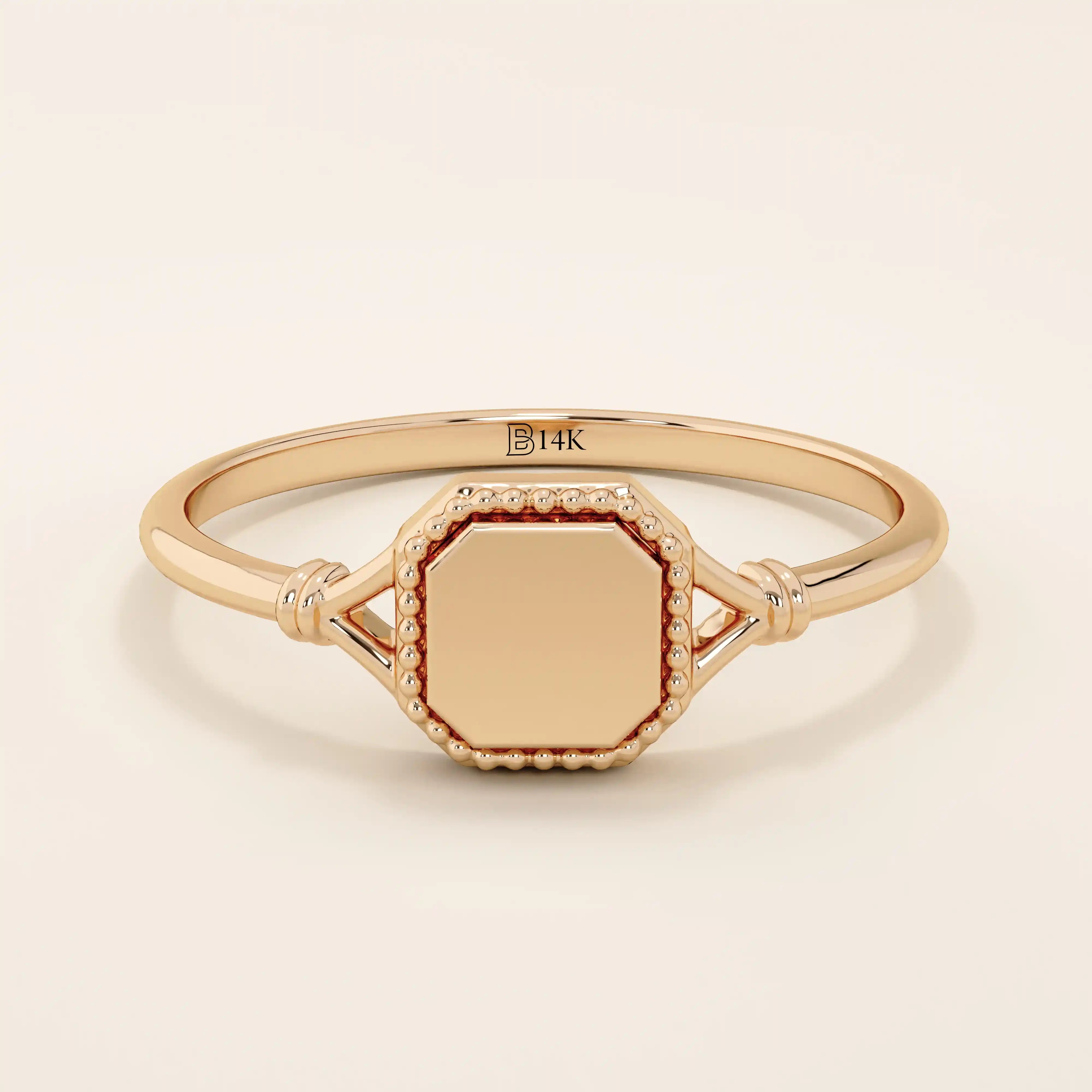 14k solid gold vintage-style square-shaped signet ring with classic detailing. Timeless and elegant design for everyday wear.