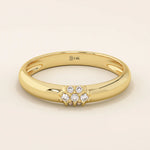 14k solid gold wedding band promise ring featuring clustered sparkling moissanites. A radiant and elegant symbol of commitment.