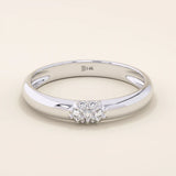 14k solid gold wedding band promise ring featuring clustered sparkling moissanites. A radiant and elegant symbol of commitment.