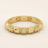 14k solid gold wedding band with pyramid-like angles and pave moissanite detailing. A bold yet refined geometric ring. Perfect as a modern wedding or stacking band.