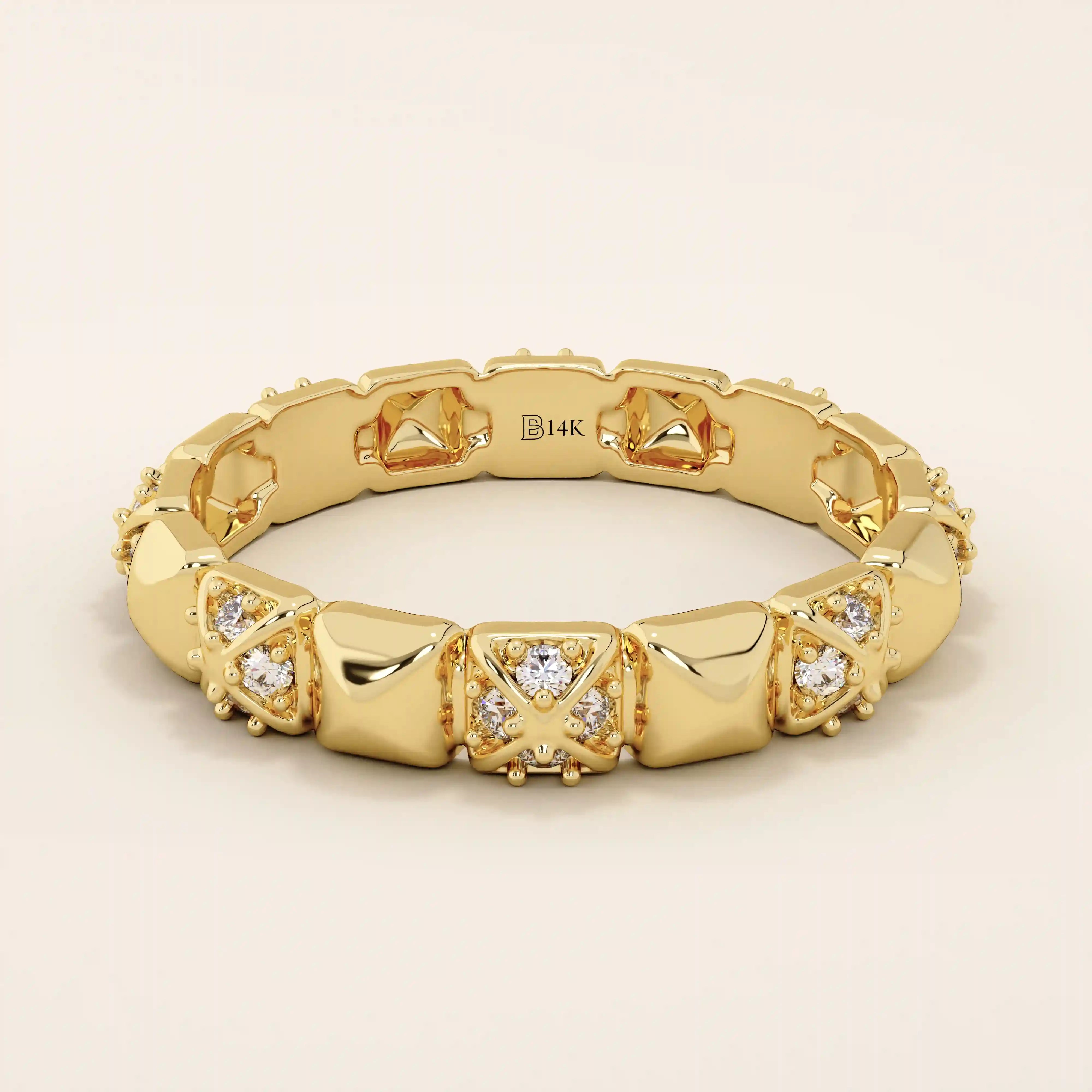 14k solid gold wedding band with pyramid-like angles and pave moissanite detailing. A bold yet refined geometric ring. Perfect as a modern wedding or stacking band.