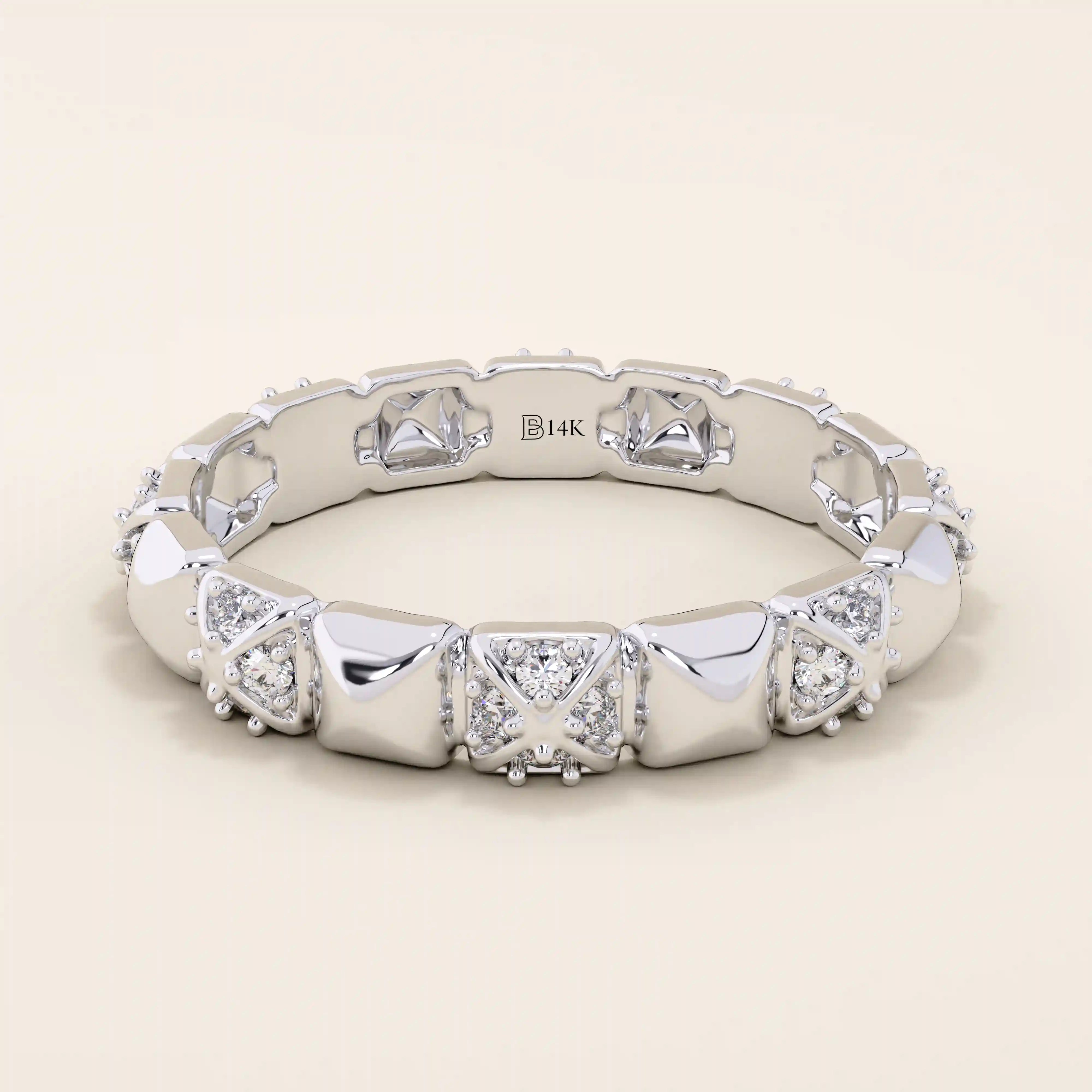 14k solid gold wedding band with pyramid-like angles and pave moissanite detailing. A bold yet refined geometric ring. Perfect as a modern wedding or stacking band.