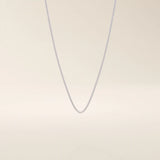 14k solid gold wheat chain necklace with a smooth, tightly woven texture. A classic gold chain with timeless appeal. Ideal for daily wear or layering.