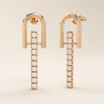 14k solid rose gold U-top bar studs with a sleek vertical moissanite line, modern and minimalist in style.
