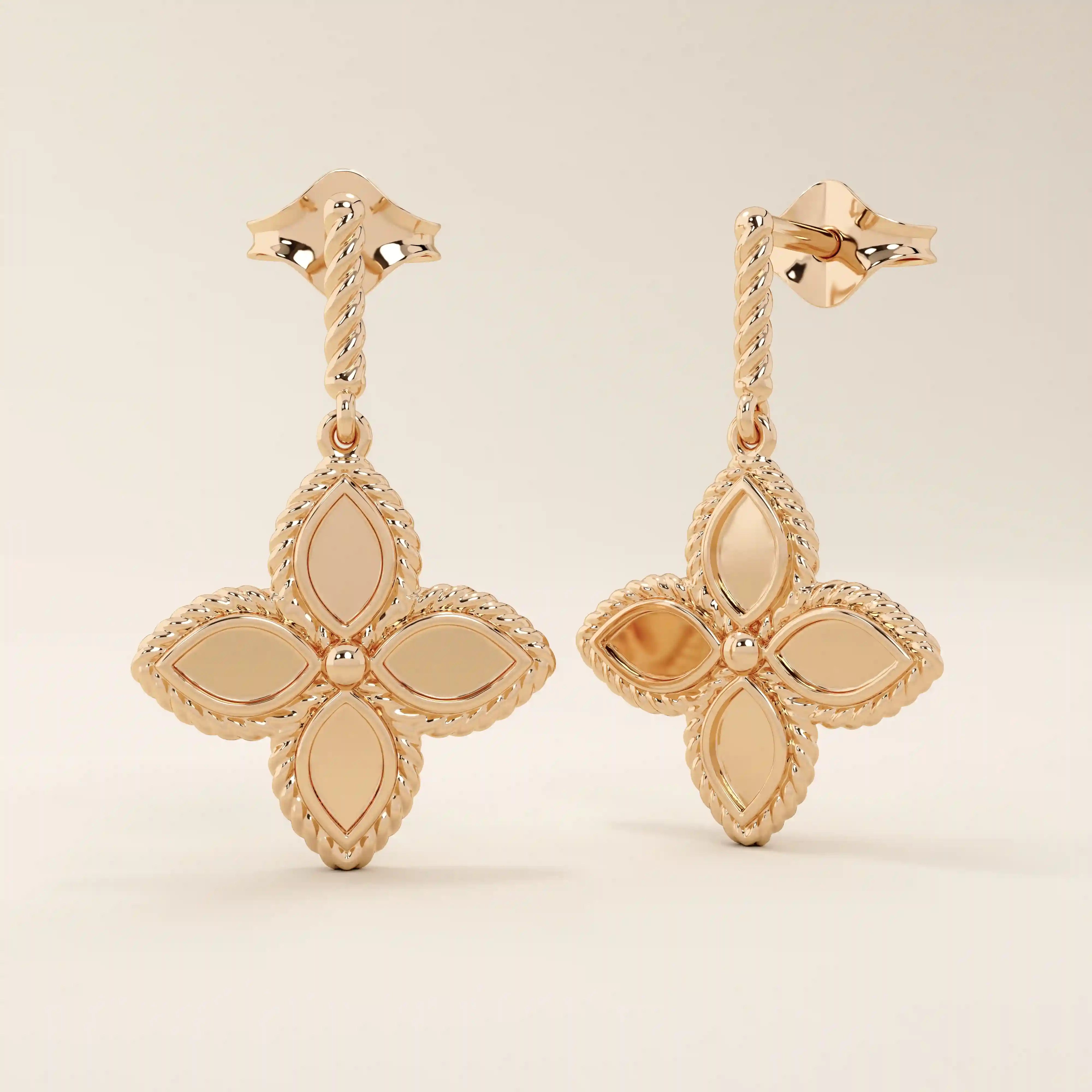 14k solid rose gold clover dangle stud earrings, showcasing a twisted post and a smooth, four-leaf flower design with detailed edging.
