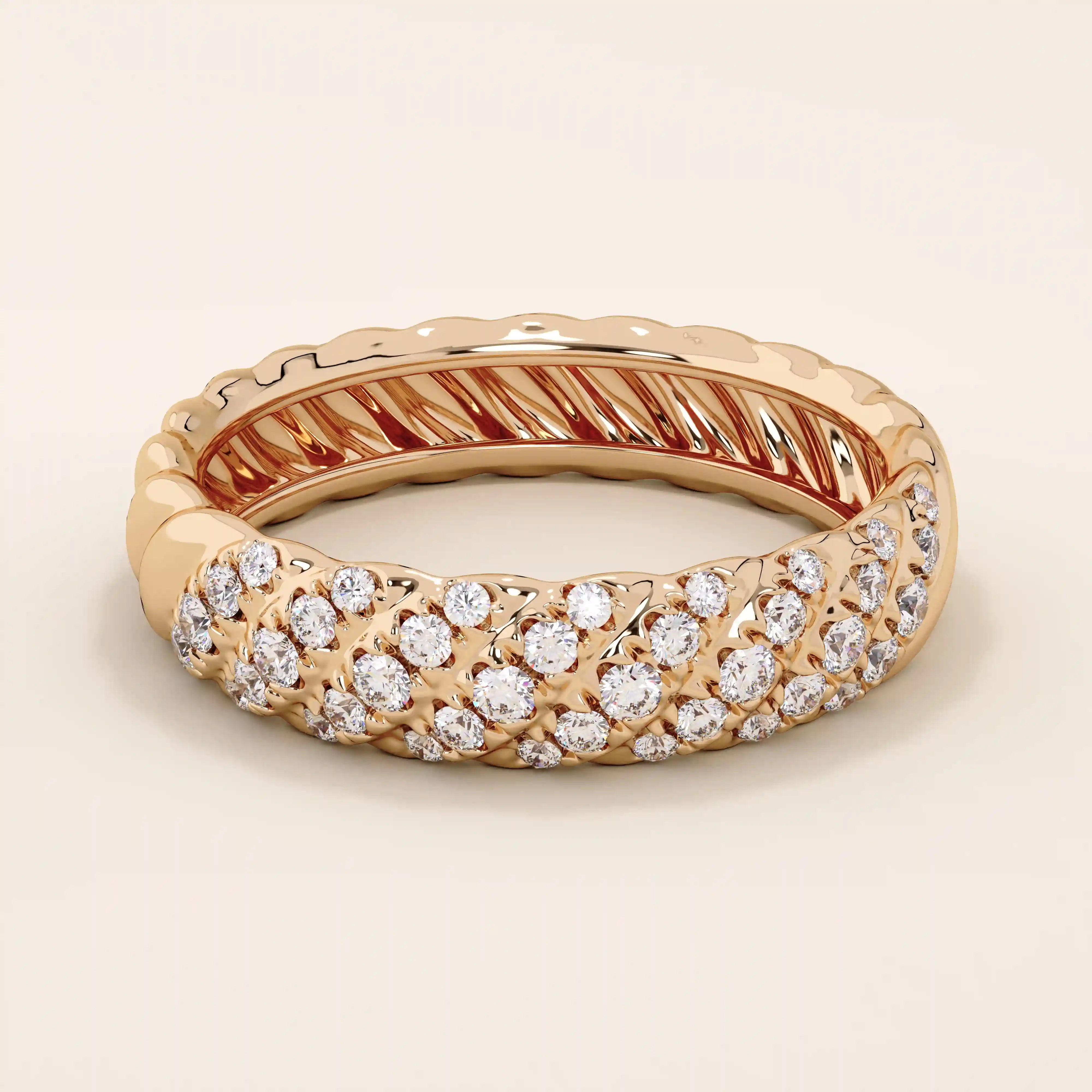 14k solid rose gold dome band showcasing rows of pavé set round brilliant cut moissanite stones, romantic and bold fine jewelry piece
