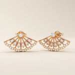 14k solid rose gold fan-shaped stud earrings with a refined lattice design, highlighted by glittering baguette and round moissanite accents.
