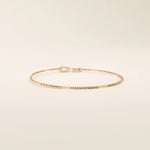 14k solid rose gold flat bar chain bracelet with polished rectangular accents, blending warm blush tones with a refined, minimal design.
