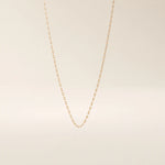 14k solid rose gold mariner chain necklace showcasing the signature flat bar-inset links, blending warm tones with timeless nautical elegance.
