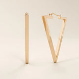 14k solid rose gold open triangle hoop earrings, blending warm, romantic tones with a sleek and angular geometric silhouette.
