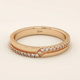 14k solid rose gold ring showcasing a pointed chevron design with pavé set round brilliant cut moissanite stones, romantic and stylish fine jewelry piece
 2