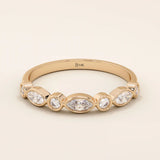 14k solid rose gold ring showcasing alternating marquise cut and round brilliant cut moissanite stones in a refined bezel setting, romantic fine jewelry gift
