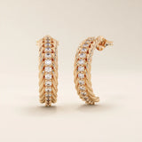 14k solid rose gold rope-textured half hoop studs with a pavé row of shimmering white moissanite stones, offering a warm-toned twist on a classic style.
