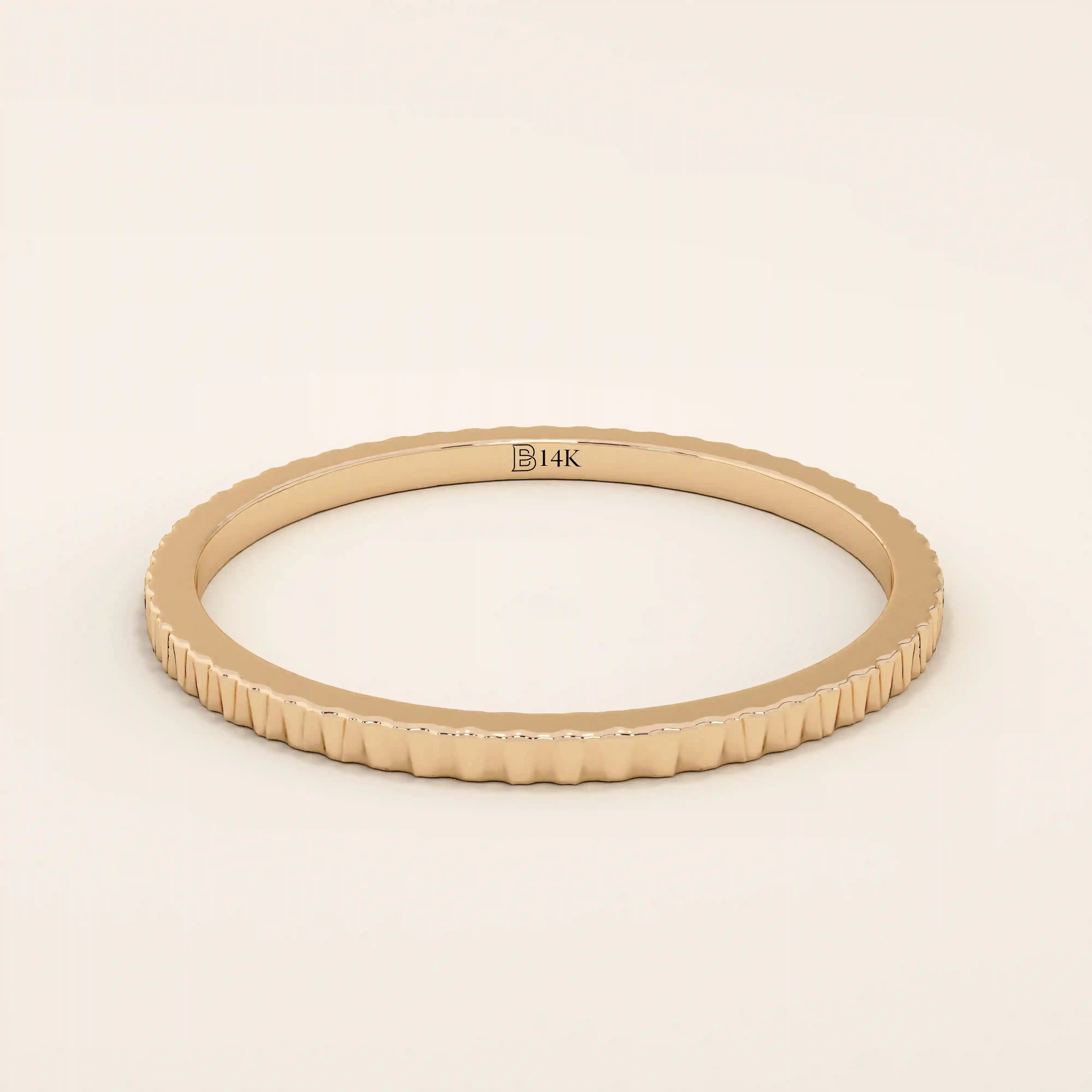 14k solid rose gold thin stacking ring with a faceted textured design, romantic and minimalist fine jewelry piece
