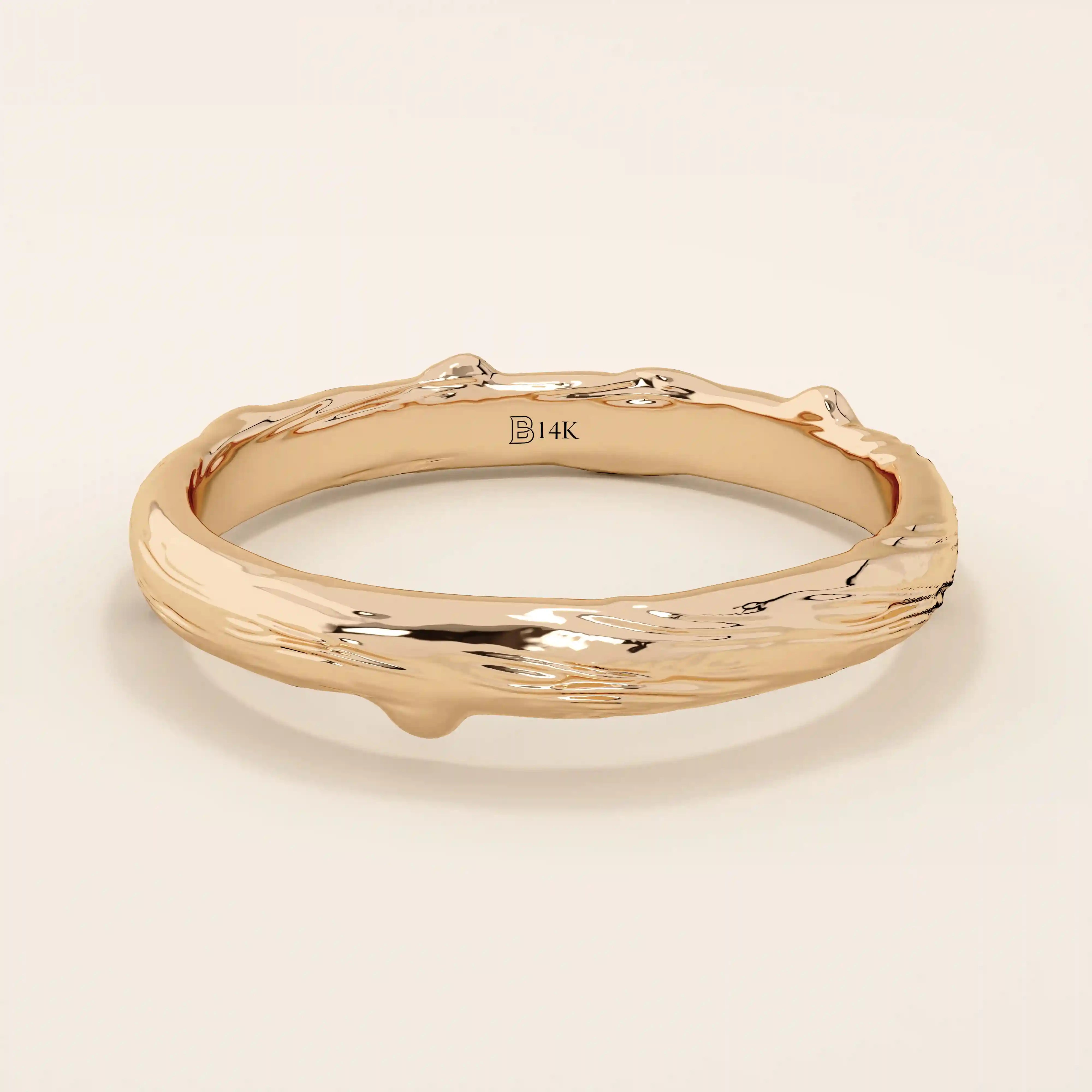 14k solid rose gold wedding band with an organic woodgrain pattern, rustic and modern design fusion
