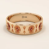 14k solid rose gold wedding band with ornate engraved floral patterns in a repeating design
