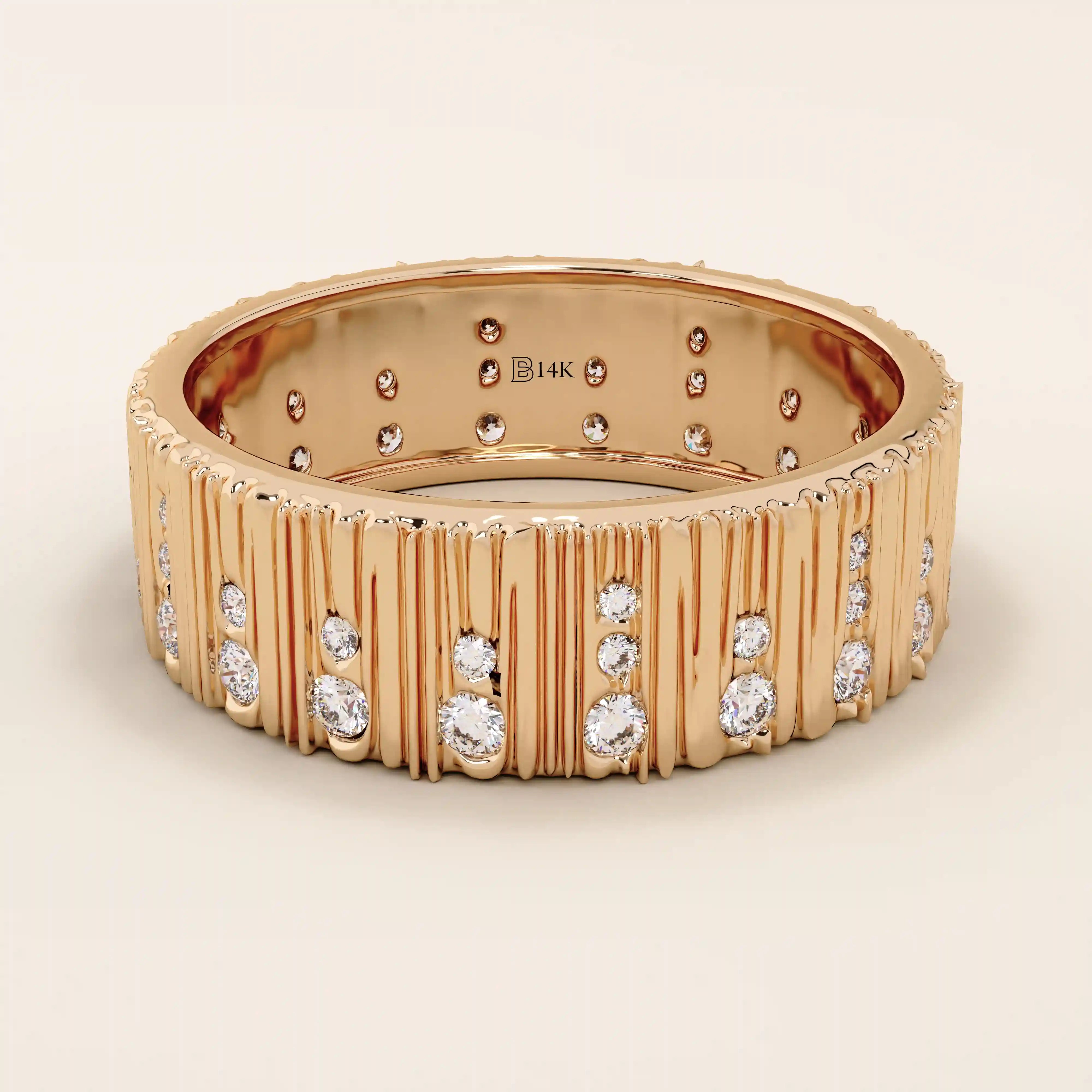 14k solid rose gold wide band showcasing a wood grain texture and pavé set round brilliant cut moissanite stones in varied sizes, romantic and bold fine jewelry piece
