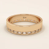 14k solid rose gold wide wedding band with sleek channel-set baguette moissanite stones around the band

