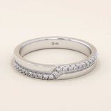14k solid white gold band with a pointed chevron shape adorned with pavé set round brilliant cut moissanite stones, elegant wedding or anniversary ring
