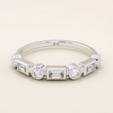 14k solid white gold band with alternating baguette cut and round brilliant cut moissanite stones in a sleek bezel setting, timeless wedding or anniversary ring
