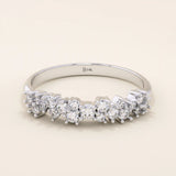 14k solid white gold band with clusters of round brilliant cut moissanite stones in prong settings, elegant and shimmering wedding or anniversary ring
