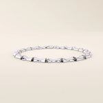 14k solid white gold bone bracelet crafted with bold, curved links in a smooth high-shine finish.
