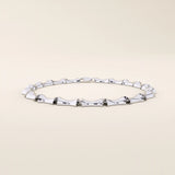 14k solid white gold bone bracelet crafted with bold, curved links in a smooth high-shine finish.

