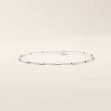 14k solid white gold bracelet with polished bar segments integrated into a fine chain, combining contemporary geometry with a refined shine.
